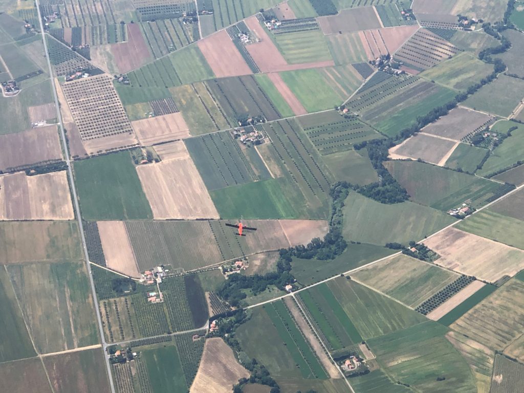 View of the Kenn Borek Aircraft (on which NASA-JPL’s HyTES sensor was operating) from above during a two aircraft flight