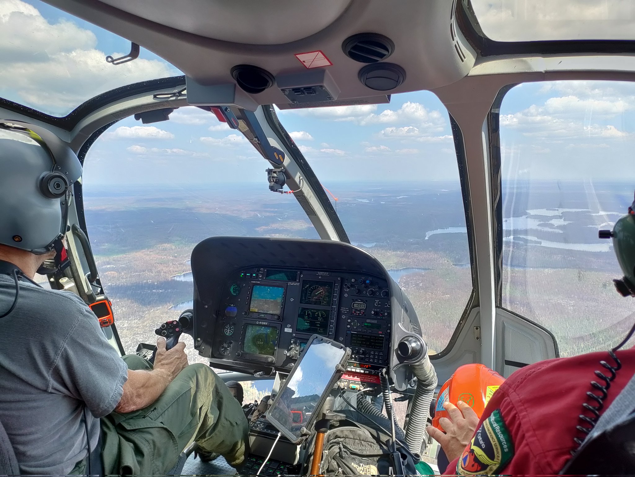 Helicopter-based gas and particulate measurements of smoke plumes.