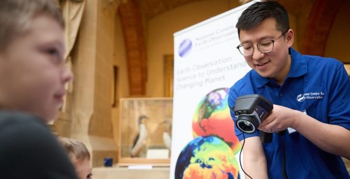 Scientist demonstrating a thermal camera
